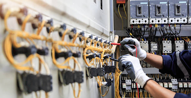 Professional Electrician technician working in Red Oaks Mill, NY